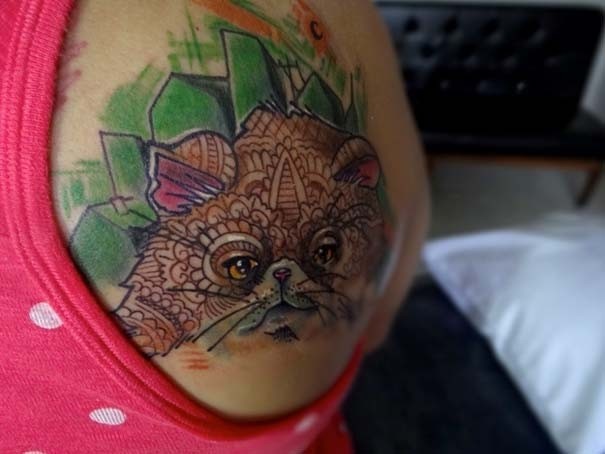 Λατρεύουν τις γάτες και τις έκαναν τατουάζ!(pics)