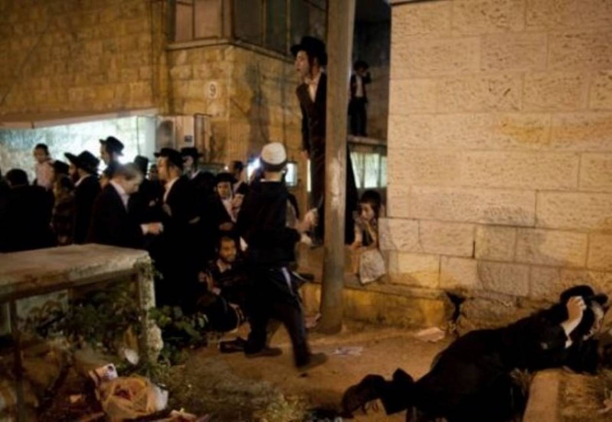 Αιματηρές συμπλοκές φανατικών Εβραίων με την Αστυνομία (pics)