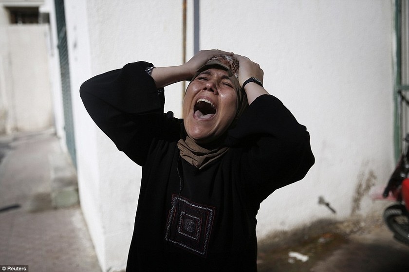 Θρήνος πάνω στα συντρίμμια της Γάζας  (Σκληρές εικόνες+video)