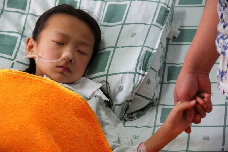 Κίνα: Αφαιρέθηκε όγκος 15 κιλών από την κοιλιά κοριτσιού! (photos)