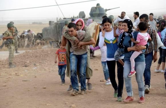Τουρκία: Πάνω από 100.000 Κούρδοι πρόσφυγες μπήκαν στη χώρα (pics)