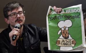 Charlie Hebdo: Tι σημαίνει το εξώφυλλο, από τον άνθρωπο που το σχεδίασε