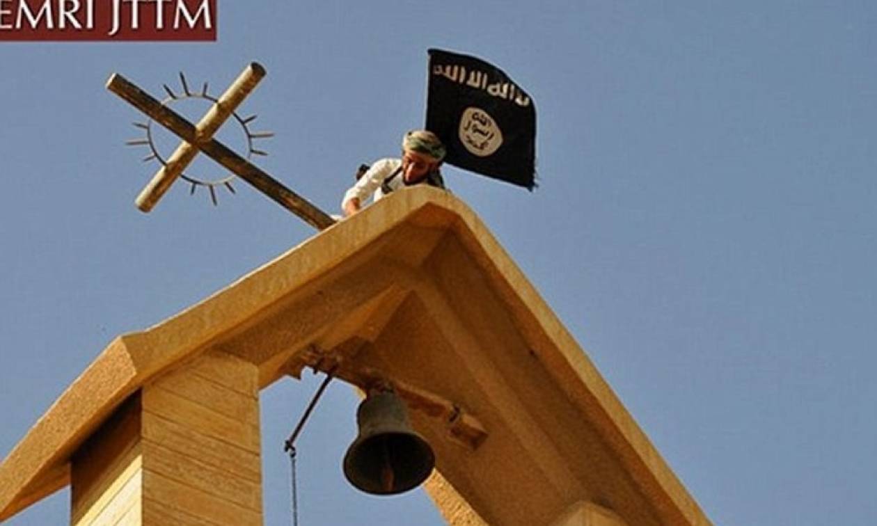 Ιράκ: Τζιχαντιστές ξηλώνουν σταυρούς από εκκλησίες (Photos)