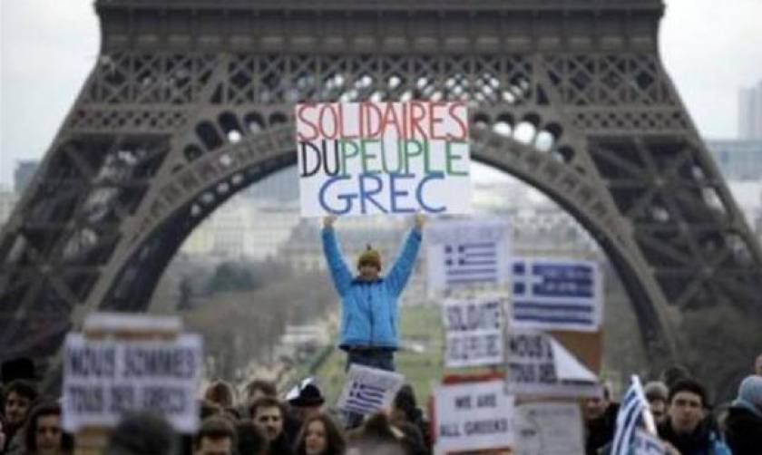 Γαλλία: Ογκώδης διαδήλωση αλληλεγγύης υπέρ της Ελλάδας (photos)