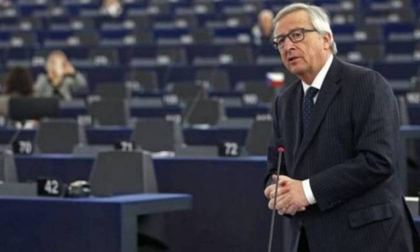 Juncker seeks to temper talk of swift Greek deal