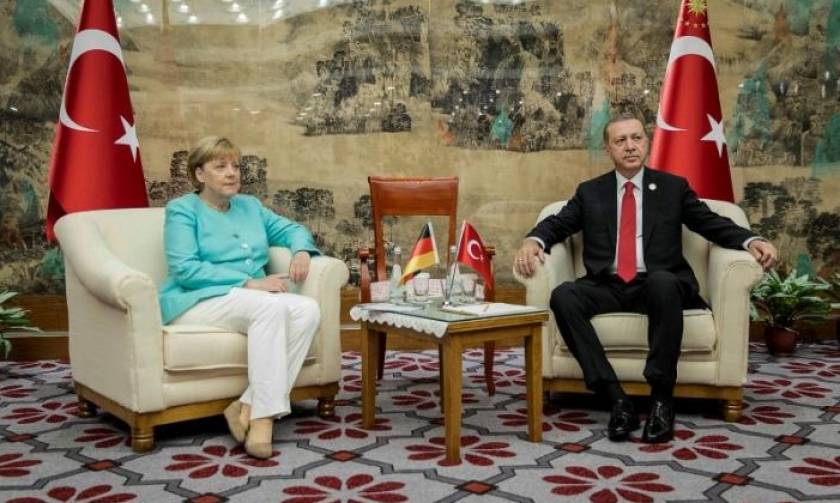 Germany's Merkel upbeat on improving ties with Erdogan after meeting