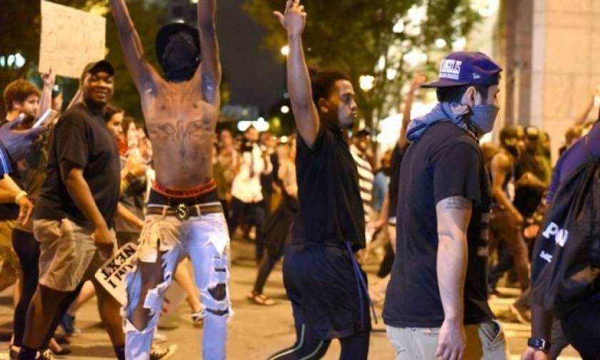 Charlotte protests diminish early on Friday as family views video