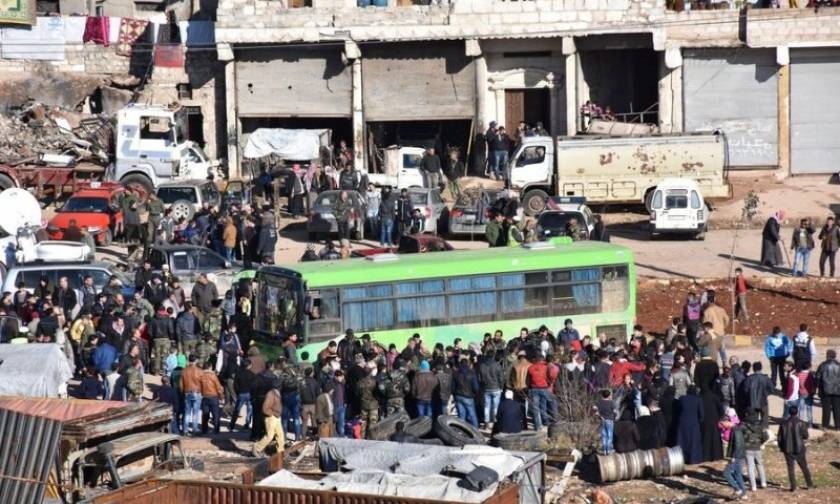 Syria suspends Aleppo evacuations, blaming rebels