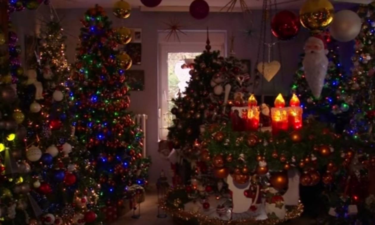 Αυτό το ζευγάρι στόλισε το σπίτι του με 100 χριστουγεννιάτικα δέντρα. Απίστευτο; (Vid)