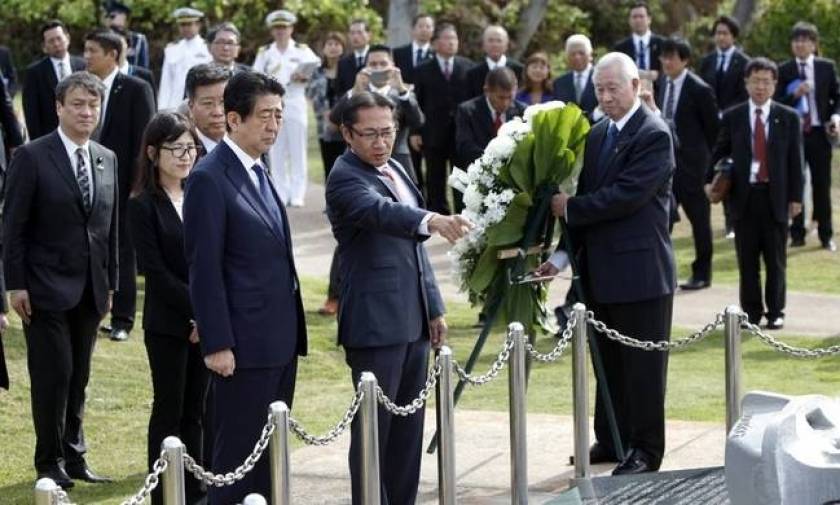 On Pearl Harbor visit, Abe pledges Japan will never wage war again