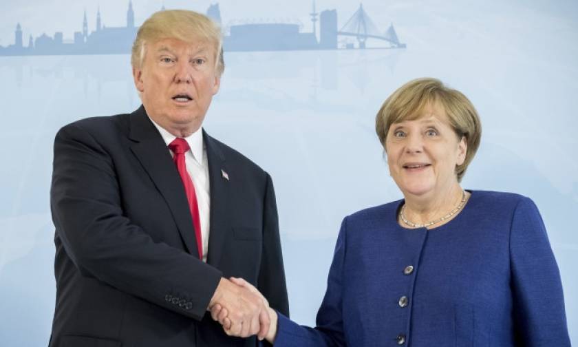 Γερμανία: Έδωσαν τα χέρια Μέρκελ - Τραμπ