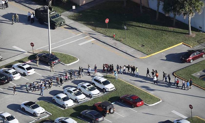 Florida school shooting: Armed officer 'did not confront killer'