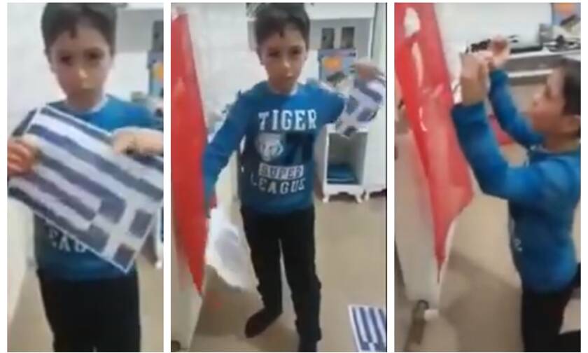 Προκλητικές εικόνες: Πιτσιρικάς στην Τουρκία σκίζει ελληνική σημαία 