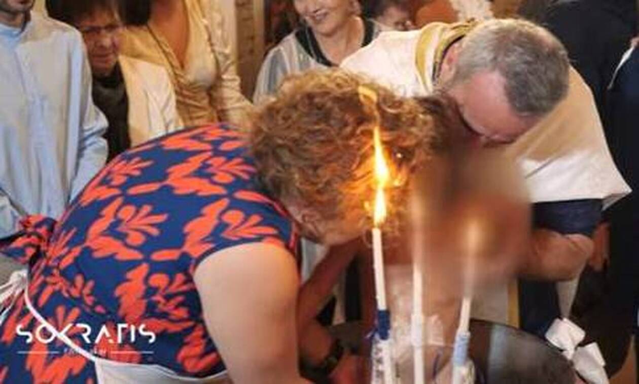 Απίστευτο βίντεο: Νονά «πήρε φωτιά» σε βάφτιση στην Κρήτη - Το στιγμιότυπο που έγινε viral